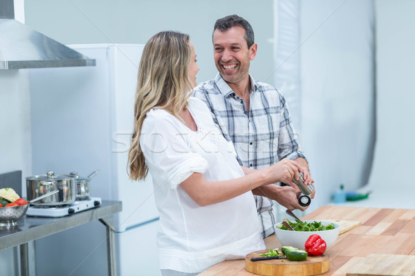 Pregnant couple in kitchen Stock photo © wavebreak_media