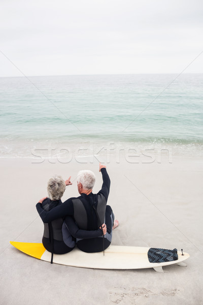 Pareja sesión tabla de surf playa mujer Foto stock © wavebreak_media