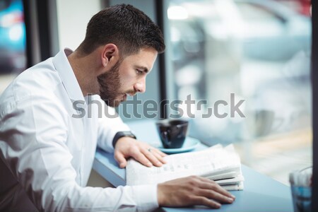 Businessman reading newspaper in office Stock photo © wavebreak_media