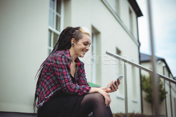 Woman using mobile phone Stock photo © wavebreak_media