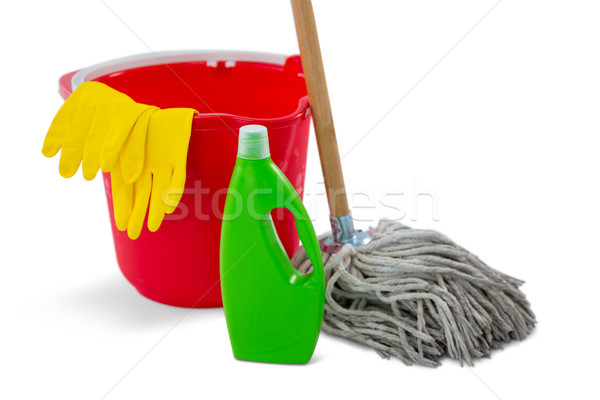 Close up of chemical bottle and mop with bucket Stock photo © wavebreak_media