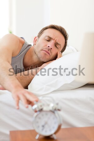 Man lying down on his bed Stock photo © wavebreak_media