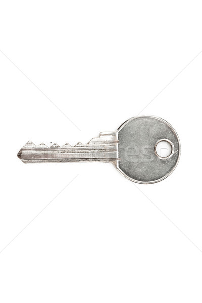 Silver key against white background Stock photo © wavebreak_media