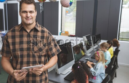 Enseignants souriant ordinateur classe [[stock_photo]] © wavebreak_media