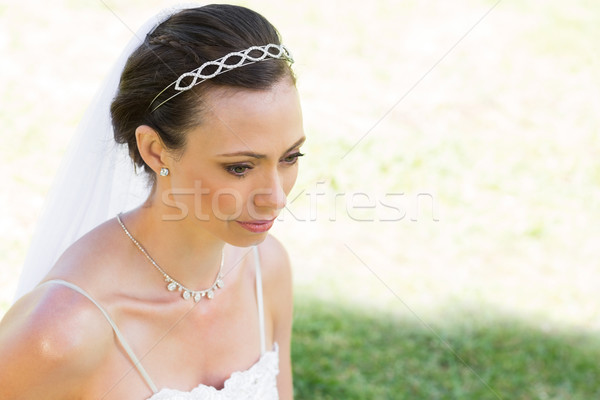 Thoughtful bride looking away in garden Stock photo © wavebreak_media
