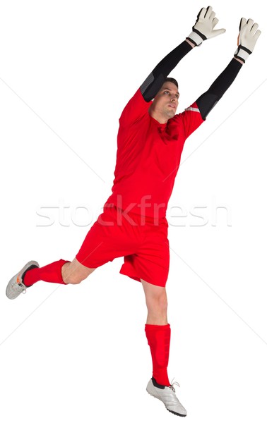 Stock photo: Fit goal keeper jumping up