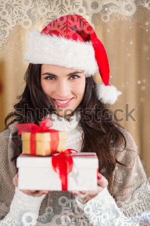 Sexy santa girl holding gift Stock photo © wavebreak_media