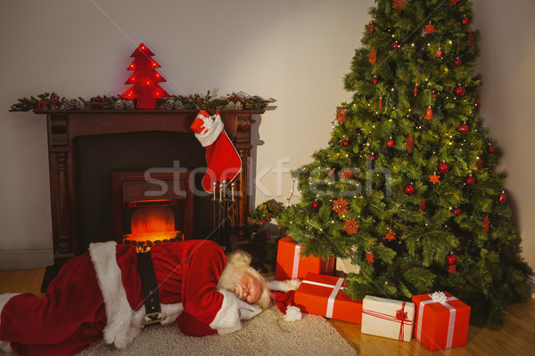 Stock photo: Santa claus sleeping on the rug