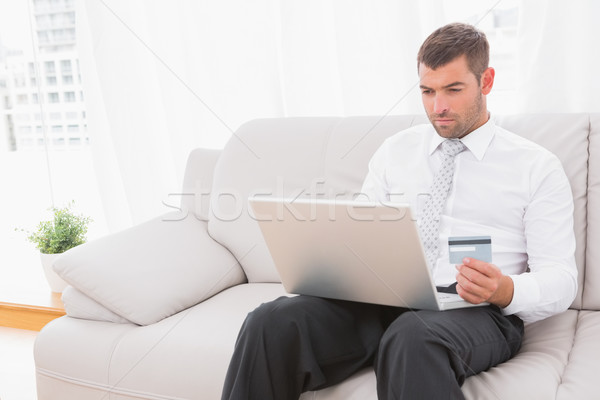 Businessman buying things in internet  Stock photo © wavebreak_media