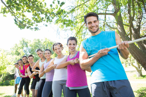 Fitness group playing tug of war Stock photo © wavebreak_media