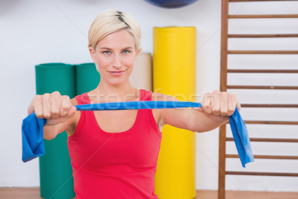 Femme blonde bras fitness studio femme [[stock_photo]] © wavebreak_media