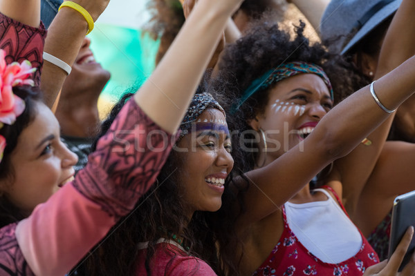 Kadın cep telefonu dans müzik festivali güzel bir kadın Stok fotoğraf © wavebreak_media