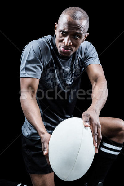 Foto stock: Determinado · rugby · jugador · pelota · jugando · negro