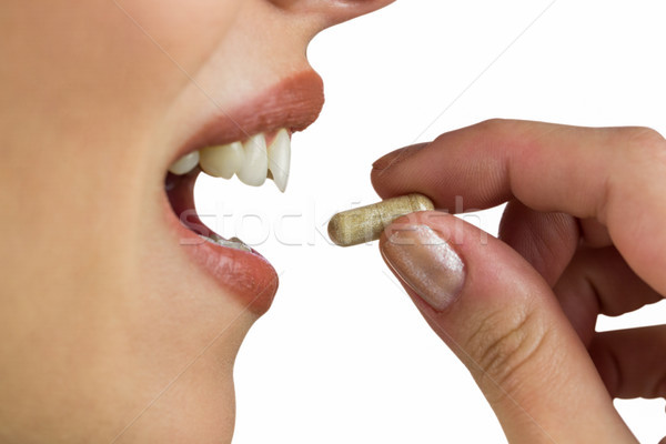 женщину таблетка белый медицинской Сток-фото © wavebreak_media