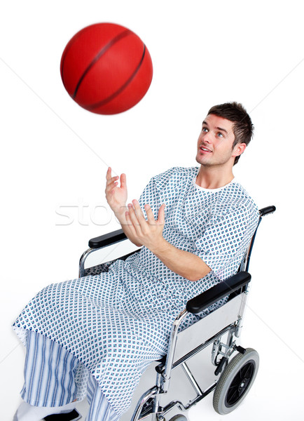 Patient in wheelchair having fun with a basket ball Stock photo © wavebreak_media