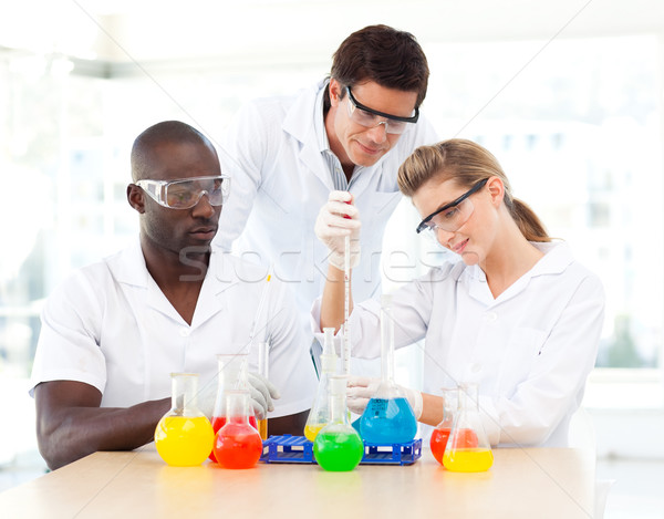 Young scientists examining test-tubes Stock photo © wavebreak_media