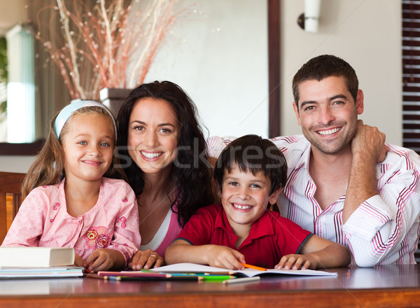 Portrait of a loving family at a braun table Stock photo © wavebreak_media