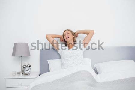 счастливым человека вверх спальня домой кровать Сток-фото © wavebreak_media