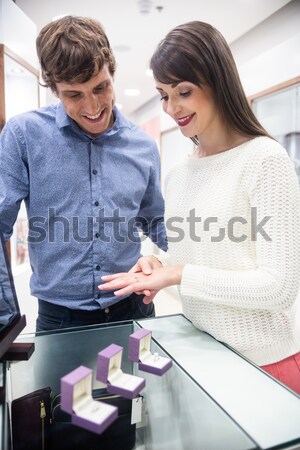 Stock photo: Doctor and patient adjusting scale