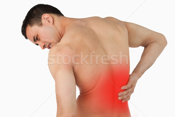 Back view of male suffering from back pain Stock photo © wavebreak_media