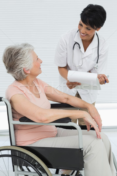 Orvos beszél idős beteg tolószék női Stock fotó © wavebreak_media