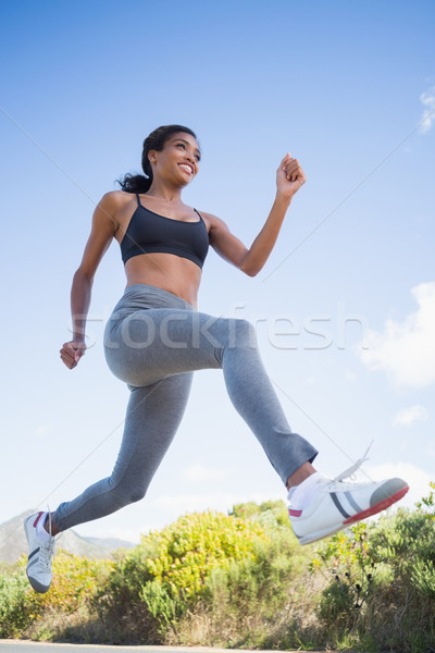 Fit woman running along the open road Stock photo © wavebreak_media