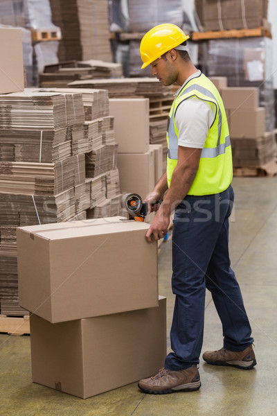 Worker preparing goods for dispatch Stock photo © wavebreak_media