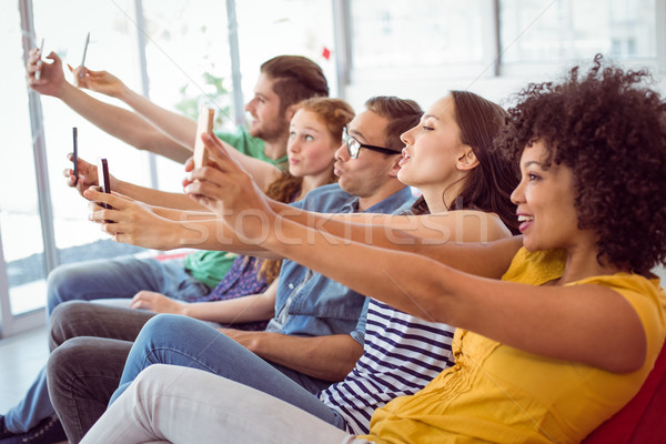 Fashion students taking a selfie  Stock photo © wavebreak_media