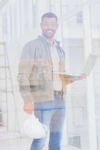 építész munkavédelmi sisak laptop iroda portré férfi Stock fotó © wavebreak_media