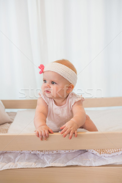 Beautiful baby girl in his bed Stock photo © wavebreak_media