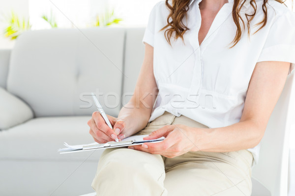 Terapeuta jegyzetel fehér nő kanapé profi Stock fotó © wavebreak_media