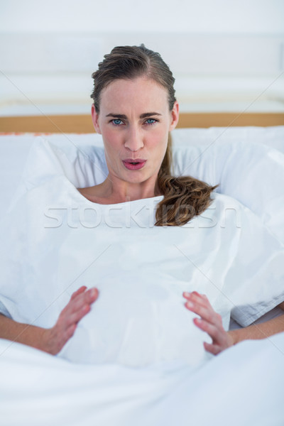 Portrait of pregnant woman suffering from pain Stock photo © wavebreak_media