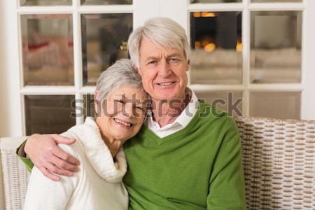 Stock photo: Cheerful man with mother standing against beach hut