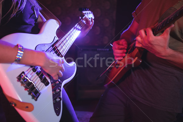 Mid section of male and female guitarist in nightclub Stock photo © wavebreak_media