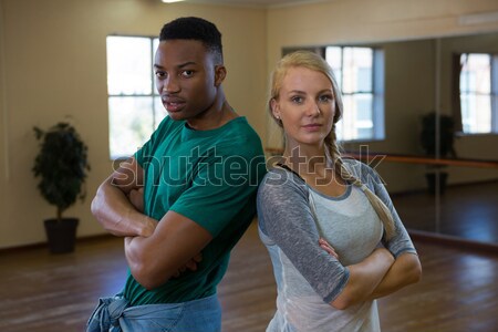 Portrait of confident young dancers in studio Stock photo © wavebreak_media