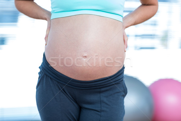 Mid section of pregnant woman in class Stock photo © wavebreak_media