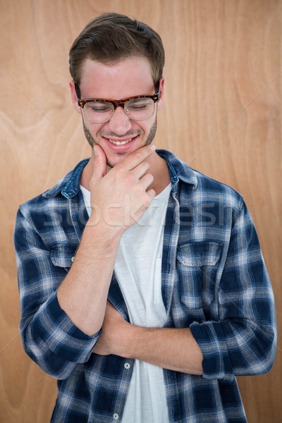 Handsome hipster with glasses with hand on chin Stock photo © wavebreak_media
