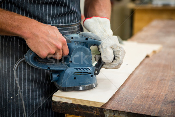 Carpenter working on his craft  Stock photo © wavebreak_media