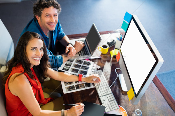 Colleagues using a graphic pad Stock photo © wavebreak_media