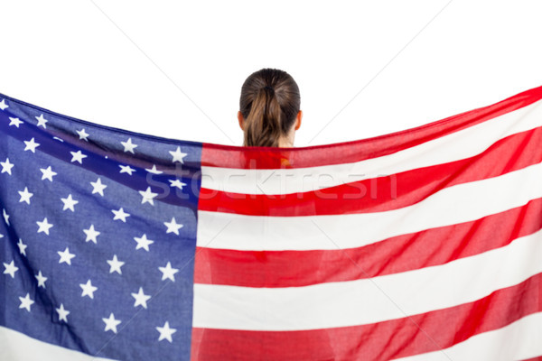 Sportowiec stwarzające amerykańską flagę zwycięstwo biały kobieta Zdjęcia stock © wavebreak_media
