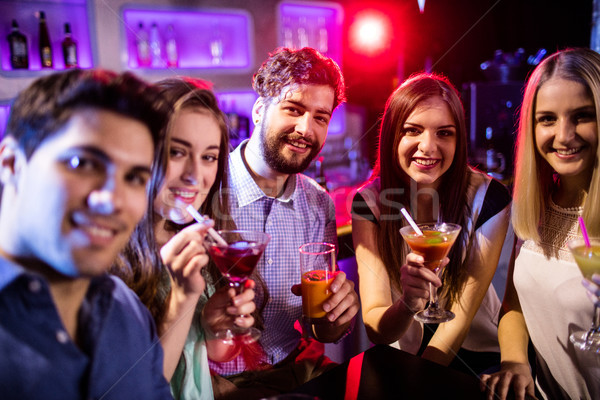 Groupe amis cocktail bar contre portrait [[stock_photo]] © wavebreak_media
