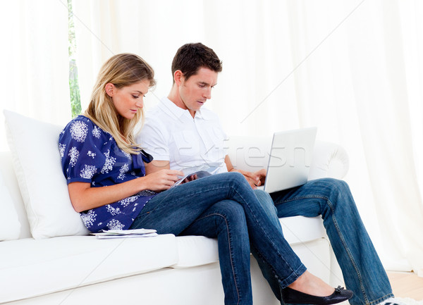 Young couple working at home Stock photo © wavebreak_media