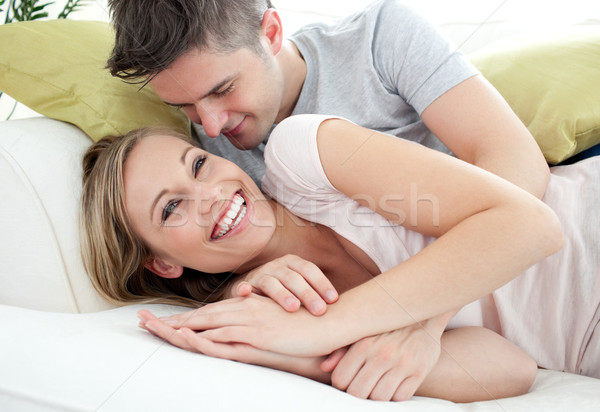 Joyful lovers having fun together on a sofa Stock photo © wavebreak_media