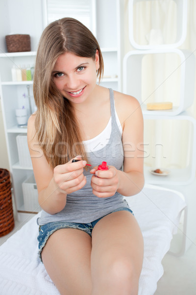 Fényes nő körömlakk mosolyog kamera kéz Stock fotó © wavebreak_media