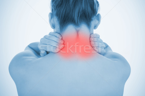 Woman with highlighted neck pain Stock photo © wavebreak_media