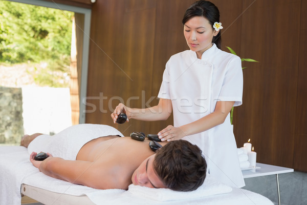 Człowiek kamień masażu spa centrum przystojny Zdjęcia stock © wavebreak_media