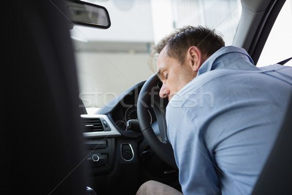 Drunk man slumped on steering wheel Stock photo © wavebreak_media