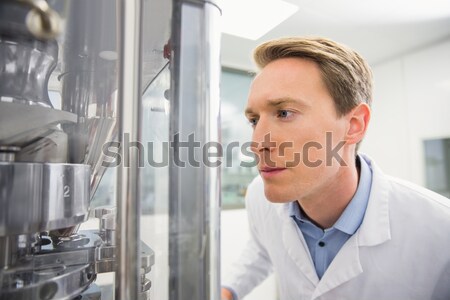 Serious technician using digital cable analyzer on server Stock photo © wavebreak_media