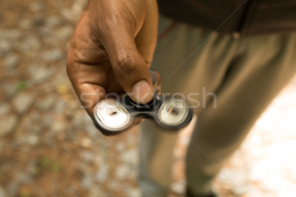 Man holding a fidget spinner Stock photo © wavebreak_media