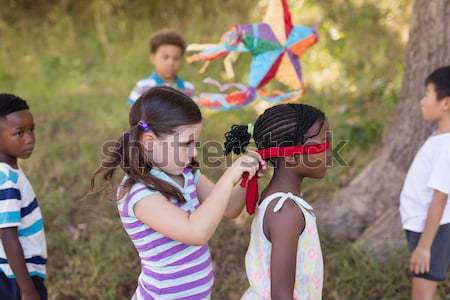 Female trainer instructing women while exercising in the boot camp Stock photo © wavebreak_media
